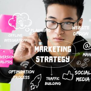 asian seo manager writing on glass with illustration of concept words of marketing strategy