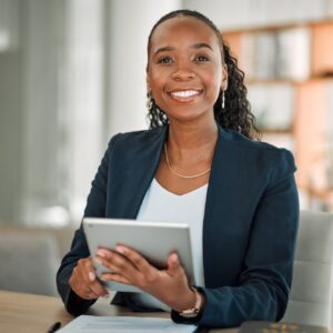 Lawyer, portrait and black woman with tablet in office for research, email and smile. African attor